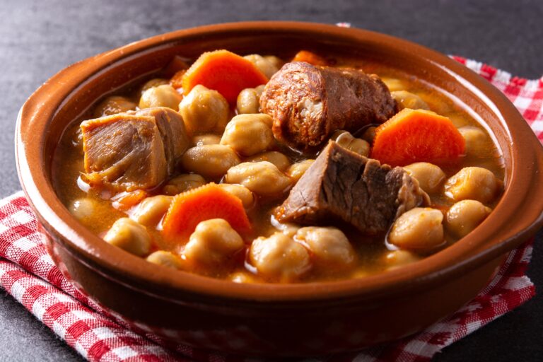 Traditional,Spanish,Cocido,Madrileño.,Chickpea,Stew,On,Black,Background