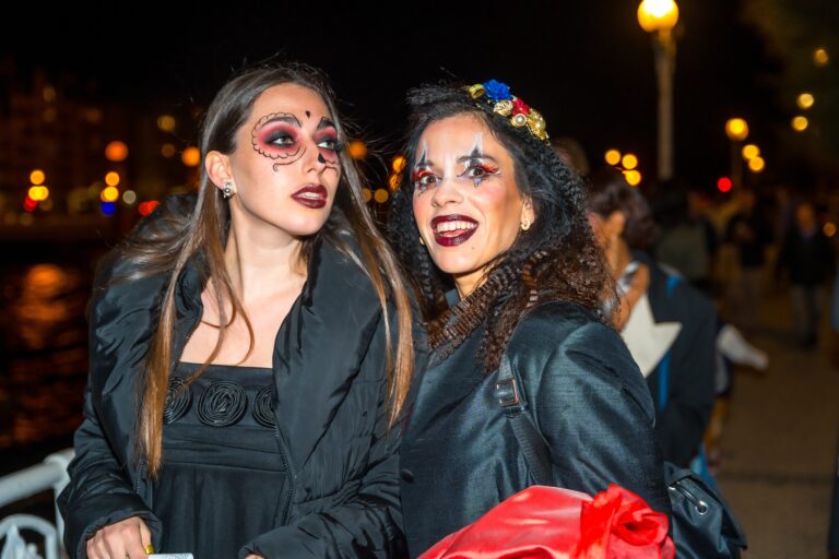 Two,Women,Are,Dressed,Up,In,Halloween,Costumes,And,Are