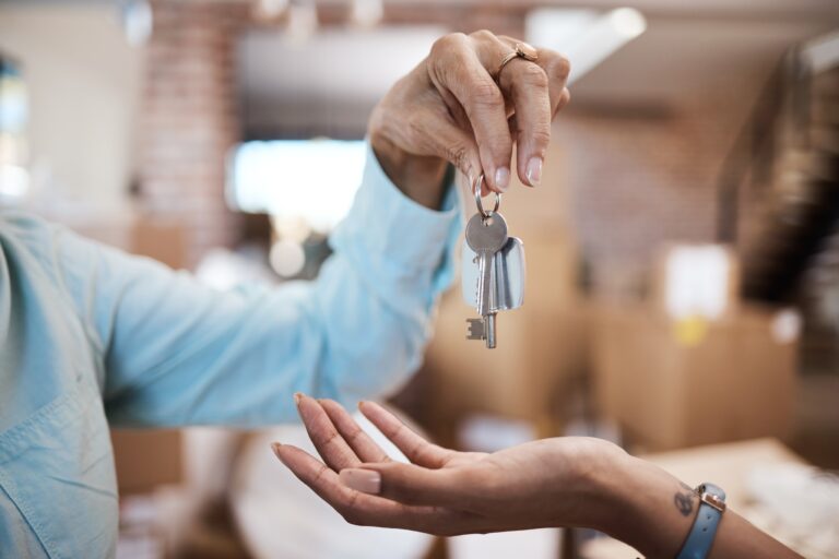 Hands,,Key,And,Landlord,In,New,Home,With,Tenant,,Property